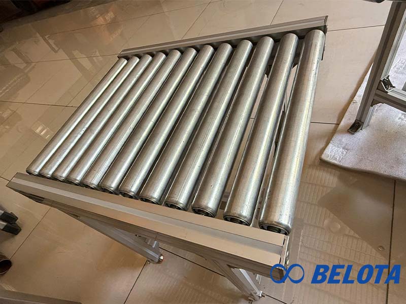Băng tải con lăn mini làm bằng thép