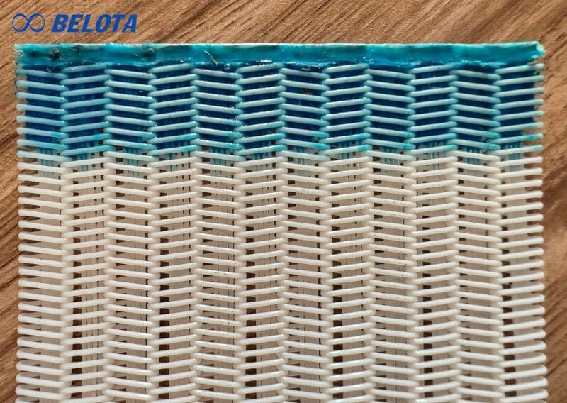 Băng tải lưới xoắn Polyester xoắn có thanh gia cường