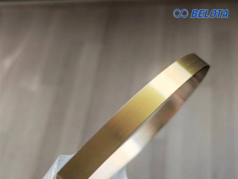 Băng tải thép phủ lớp chống dính màu vàng