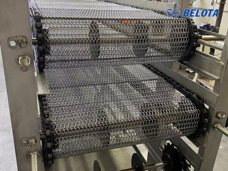 Băng tải xích lưới inox là giải pháp thay thế hoàn hảo cho băng tải PVC hoặc lưới ma sát 