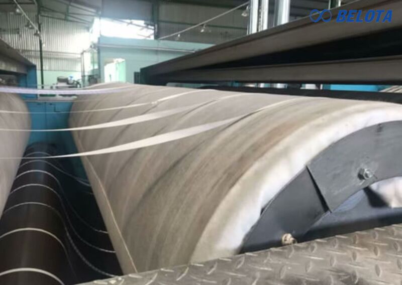 Đệm nỉ lót máy ủi công nghiệp là vật liệu chịu nhiệt được lắp trên con lăn